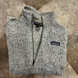 Women’s New Patagonia quarter zip fleece jacket.